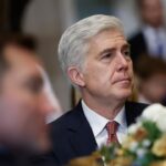 Neil Gorsuch seated