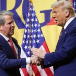 President Donald Trump and Ga. Gov. Brian Kemp shaking hands