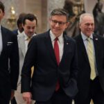 Speaker of the House Mike Johnson is shown leaving the House Chamber.