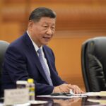 Chinese President Xi Jinping seated