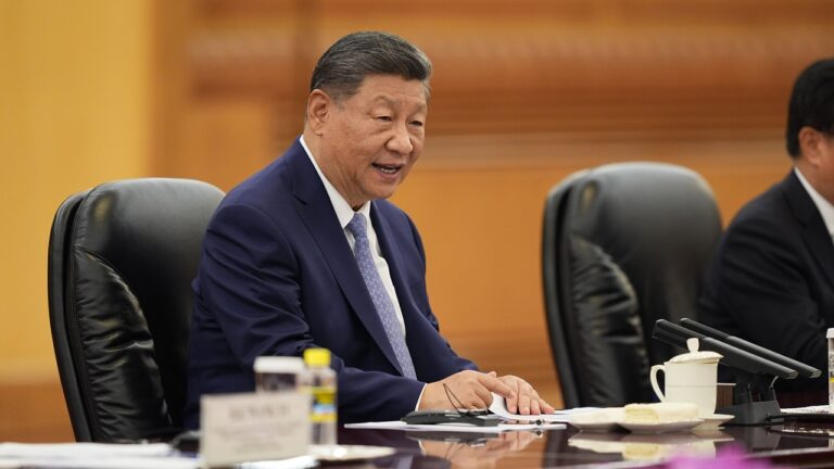 Chinese President Xi Jinping seated