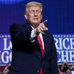 U.S. President Donald Trump takes the stage to speak during a rally at the Horizon Events Center on January 27, 2026 in Clive, Iowa.