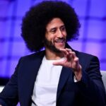 Colin Kaepernick speaking while seated