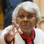 Sen. L. Louise Lucas points toward a camera.