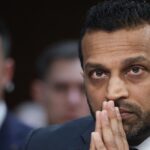 Kash Patel with his hands clasped