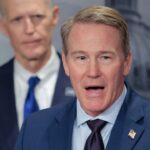 Sen. Jon Husted (R-OH) speaks to reporters during a news conference.