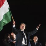 Peter Magyar waving the Hungarian flag