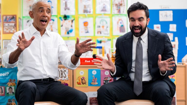 Barack Obama and Zohran Mamdani singing and moving their hands in a classroom