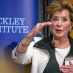 Education Secretary Linda McMahon seated