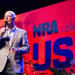 Doug Hamlin, CEO of the National Rifle Association, speaking on a stage