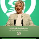 Northern Ireland First Minister Michelle O'Neill speaking at a podium