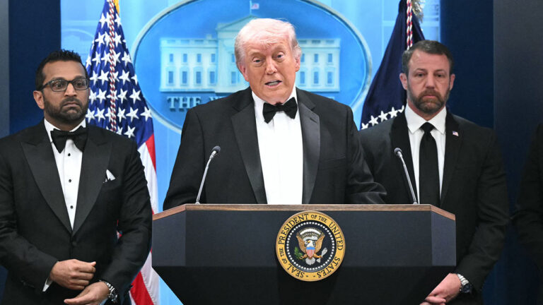 President Donald Trump speaks, flanked by FBI Director Kash Patel and US Secretary of Homeland Security Markwayne Mullin, during a press briefing in the Brady Briefing Room at the White House in Washington, DC, shortly after a shooting incident at the White House Correspondents’ Dinner on April 25, 2026.