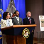 Jeanine Pirro, Kash Patel, and Darren Cox at a press conference