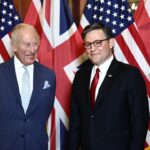 King Charles and Mike Johnson standing