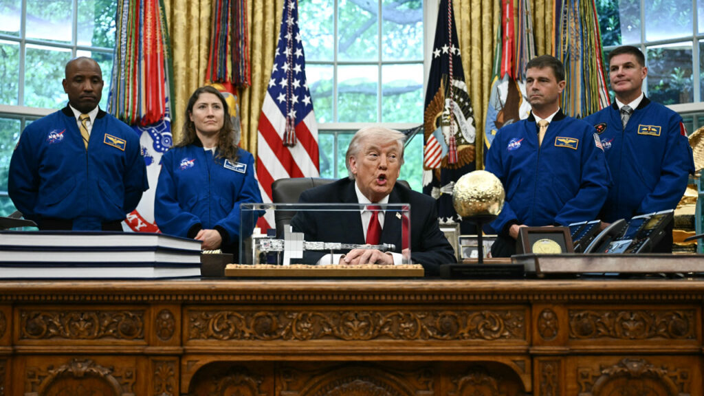 US President Donald Trump speaks as he welcomes the Artemis II astronauts, from L to R, Victor Glover, Christina Koch, Reid Wiseman and Jeremy Hansen in the Oval Office at the White House in Washington, DC, on April 29, 2026.
