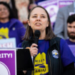 Maine Secretary of State and candidate for Governor Shenna Bellows speaks during a May Day rally organized by local unions.