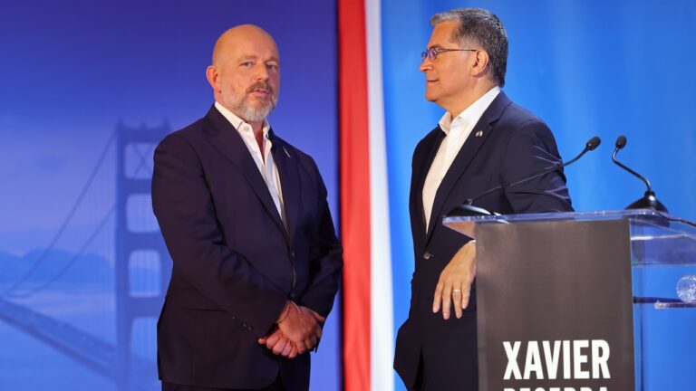 Steve Hilton and Xavier Becerra speak during a California gubernatorial debate.