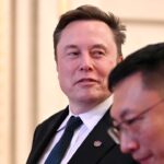 Elon Musk smiling