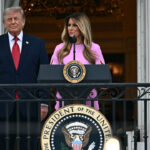 US First Lady Melania Trump, accompanied by President Donald Trump, speaks during the Congressional Picnic on the South Lawn of the White House on May 19, 2026.