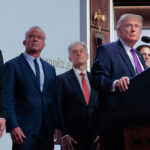 U.S. President Donald Trump speaks as (L-R) Center for Medicare Director Chris Klomp, U.S. Health and Human Services Secretary Robert F. Kennedy Jr. Centers for Medicare and Medicaid Services Administrator Mehmet Oz.