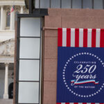 A banner for America's 250th celebration is displayed, with the U.S. Capitol in the background.