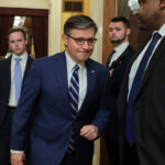 U.S. Speaker of the House Mike Johnson walking.