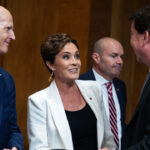 Sen. Rick Scott and Kari Lake arrive for a Senate Foreign Relations Committee hearing.