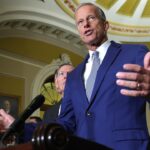 Senate Majority Leader John Thune speaking at a press conference