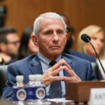 Former NIH Director Anthony Fauci listens during a hearing.