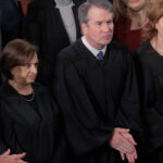WASHINGTON, DC - FEBRUARY 24: U.S. Supreme Court Chief Justice John Roberts and Associate Justices Elena Kagan, Brett Kavanaugh and Amy Coney Barrett applaud at the conclusion of President Donald Trump's State of the Union address during a joint session of Congress at the Capitol on February 24, 2026, in Washington, DC. Trump delivered his address days after the Supreme Court struck down the administration's tariff strategy and amid a U.S. military buildup in the Persian Gulf threatening Iran. (Photo by Chip Somodevilla/Getty Images)