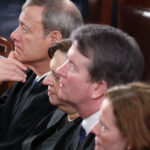 Supreme Court Chief Justice John Roberts, Associate Justice Elena Kagan, Associate Justice Brett Kavanaugh and Associate Justice Amy Coney Barrett attend the State of the Union address during a Joint Session of Congress at the U.S. Capitol on February 24, 2026, in Washington, DC. Trump delivered his address days after the Supreme Court struck down the administration's tariff strategy and amid a U.S. military buildup in the Persian Gulf threatening Iran. (Photo by Win McNamee/Getty Images)