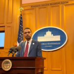 State Rep. Josh Williams stands behind the podium as he introduces a bill inside the Harding Senate Briefing Room.