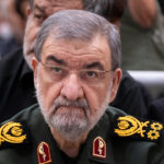 Mohsen Rezaei, an Islamic Revolutionary Guard Corps general, looks on while attending a ceremony at Ayatollah Ruhollah Khomeini's shrine.