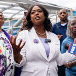 D.C. Ward 4 Council member Janeese Lewis George, candidate for D.C. mayor, addresses supporters to Prince Hall Masonic Temple, a polling location, to vote in Washington, D.C. on Monday, June 8, 2026.