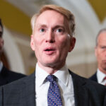 James Lankford, R-Okla., center, Senate Majority Leader John Thune, R-S.D., right, and Sen. Tom Cotton, R-Ark., talk with reporters after the Senate luncheons in the U.S. Capitol.