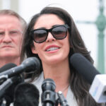 Rep. Anna Paulina Luna, R-Fla. speaks into a bank of microphones,