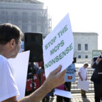 WASHINGTON, DC - APRIL 22: Wael Elkoshairi, right, a parent in the Montgomery County MD speaks to restore the Opt-Out policy in public schools at a rally as oral arguments on Mahmoud v. Taylor, a religious freedom case involving LBGTQ+ curriculum. A diverse coalition of plaintiffs seek to defend their rights as religious parents to be notified and opt their children out of Montgomery County Maryland's controversial LGBTQ curriculum at the Supreme Court in Washington, DC on April 22, 2025. (Photo by John McDonnell/For The Washington Post via Getty Images)