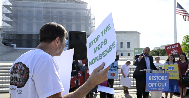WASHINGTON, DC - APRIL 22: Wael Elkoshairi, right, a parent in the Montgomery County MD speaks to restore the Opt-Out policy in public schools at a rally as oral arguments on Mahmoud v. Taylor, a religious freedom case involving LBGTQ+ curriculum. A diverse coalition of plaintiffs seek to defend their rights as religious parents to be notified and opt their children out of Montgomery County Maryland's controversial LGBTQ curriculum at the Supreme Court in Washington, DC on April 22, 2025. (Photo by John McDonnell/For The Washington Post via Getty Images)