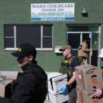 Law enforcement agents raid Mini Childcare (formerly Mako Childcare) in Minneapolis.