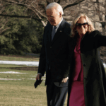 Then-President Joe Biden and then-first lady Jill Biden walk on the South Lawn after they returned to the White House on Jan. 17, 2025. (Alex Wong/Getty Images)