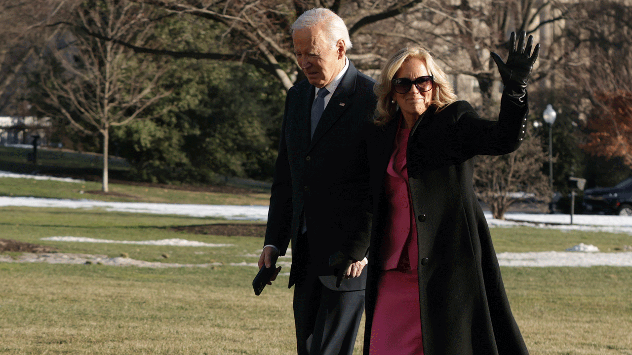 Then-President Joe Biden and then-first lady Jill Biden walk on the South Lawn after they returned to the White House on Jan. 17, 2025. (Alex Wong/Getty Images)