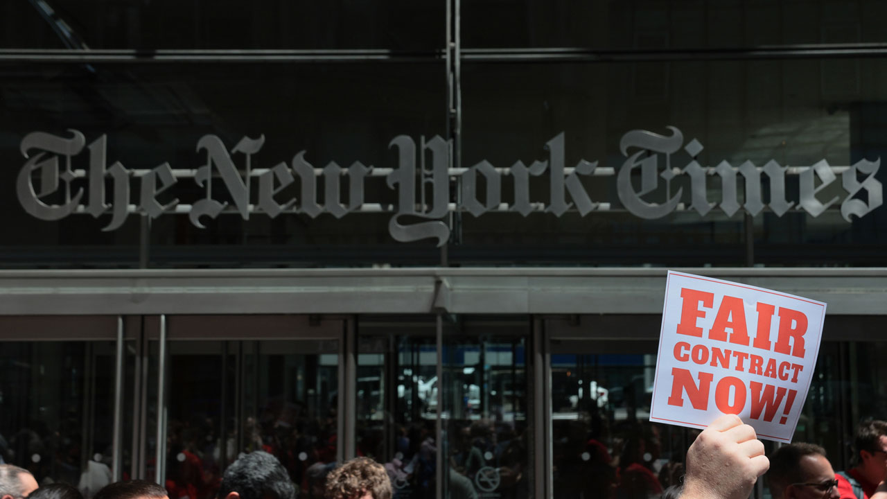 Home 4 Members of the New York Times Guild gather for a rally outside of the New York Times building on May 20, 2026 in New York City.