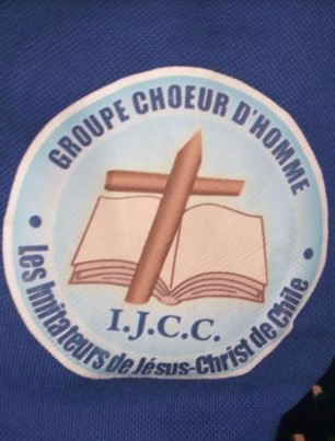 A circular logo featuring a cross and an open book, surrounded by French text: Groupe Choeur d'Homme and Les Imitateurs de Jésus-Christ de Chilé—highlighting the inclusion of Haitians within the community—with I.J.C.C. at the bottom.