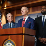 Sen. Rick Scott Pushes Bill to Ban Chinese Digital Currency in US Transactions 2 Sen. Rick Scott (c), Rep. Carlos Gimenez, Rep. Maria Elvira Salazar, and Rep. Byron Donalds.