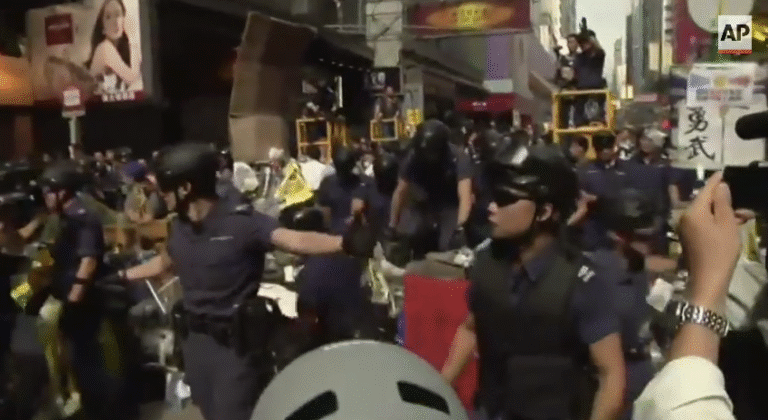 Hong Kong Police Dismantle Protest Site