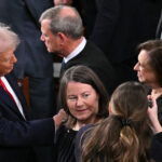 President Donald Trump shakes hands with Supreme Court Justice Elena Kagan (2R) as he arrives to deliver his State of the Union address in the House Chamber of the US Capitol in Washington, DC, on February 24, 2026. (Photo by Mandel NGAN / AFP via Getty Images)