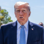 Trump speaks to reporters.