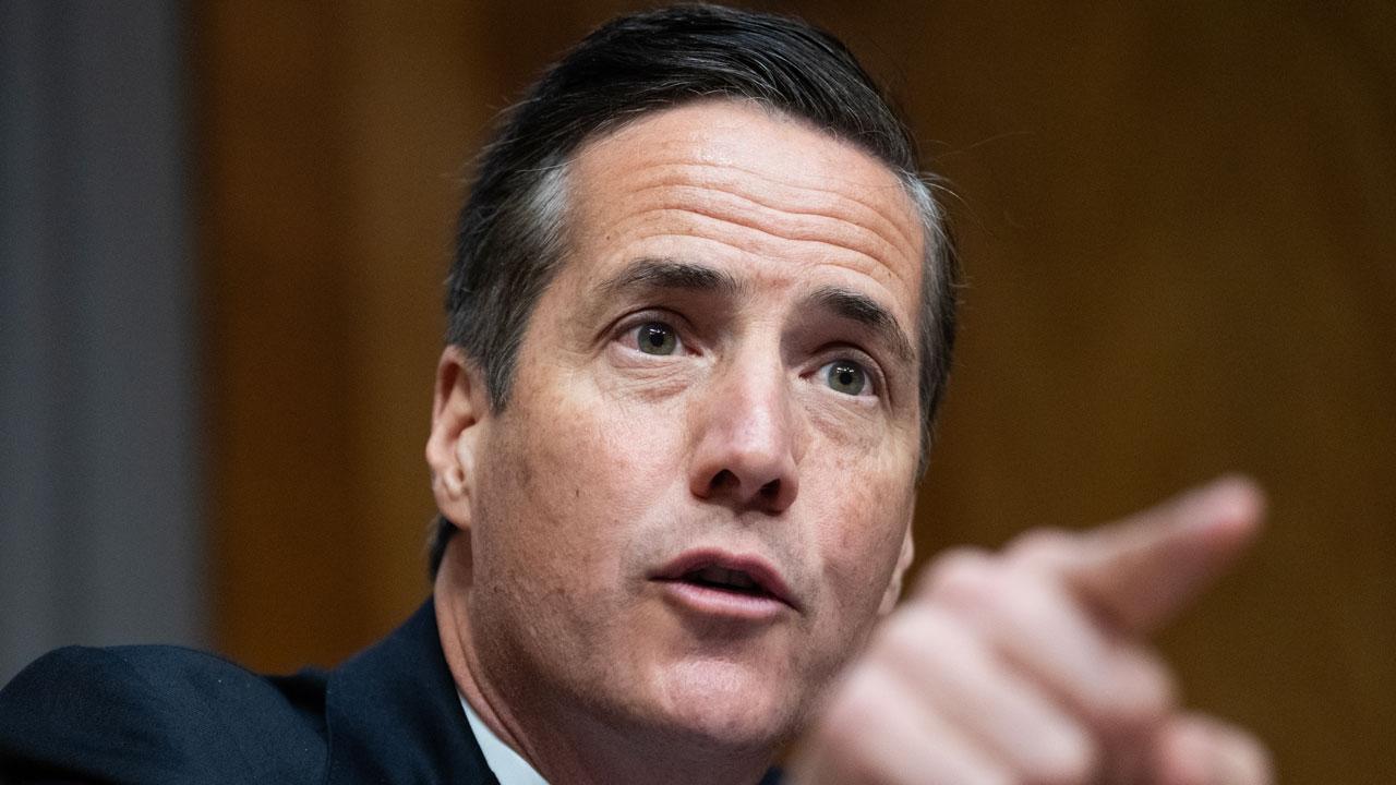 Sen. Bernie Moreno points in front of him to gesture during a hearing.