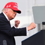 Donald Trump dances as he departs after speaking at the Port of Corpus Christi on February 27, 2026 in Corpus Christi, Texas.