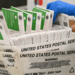 An election worker processes mail-in ballots at the Los Angeles County Ballot Processing Center during California's state primary election in the City of Industry, California, on June 2, 2026. Californians go to the polls Tuesday in the first round of voting for a new governor, with a tight three-way race for two run-off spots, while people in Los Angeles will also be voting for a new mayor. The state's so-called "jungle primary" pits all comers against each other -- regardless of party -- with the top two vote-getters advancing to the November general election to replace term-limited Governor Gavin Newsom. (Photo by Patrick T. Fallon / AFP via Getty Images)